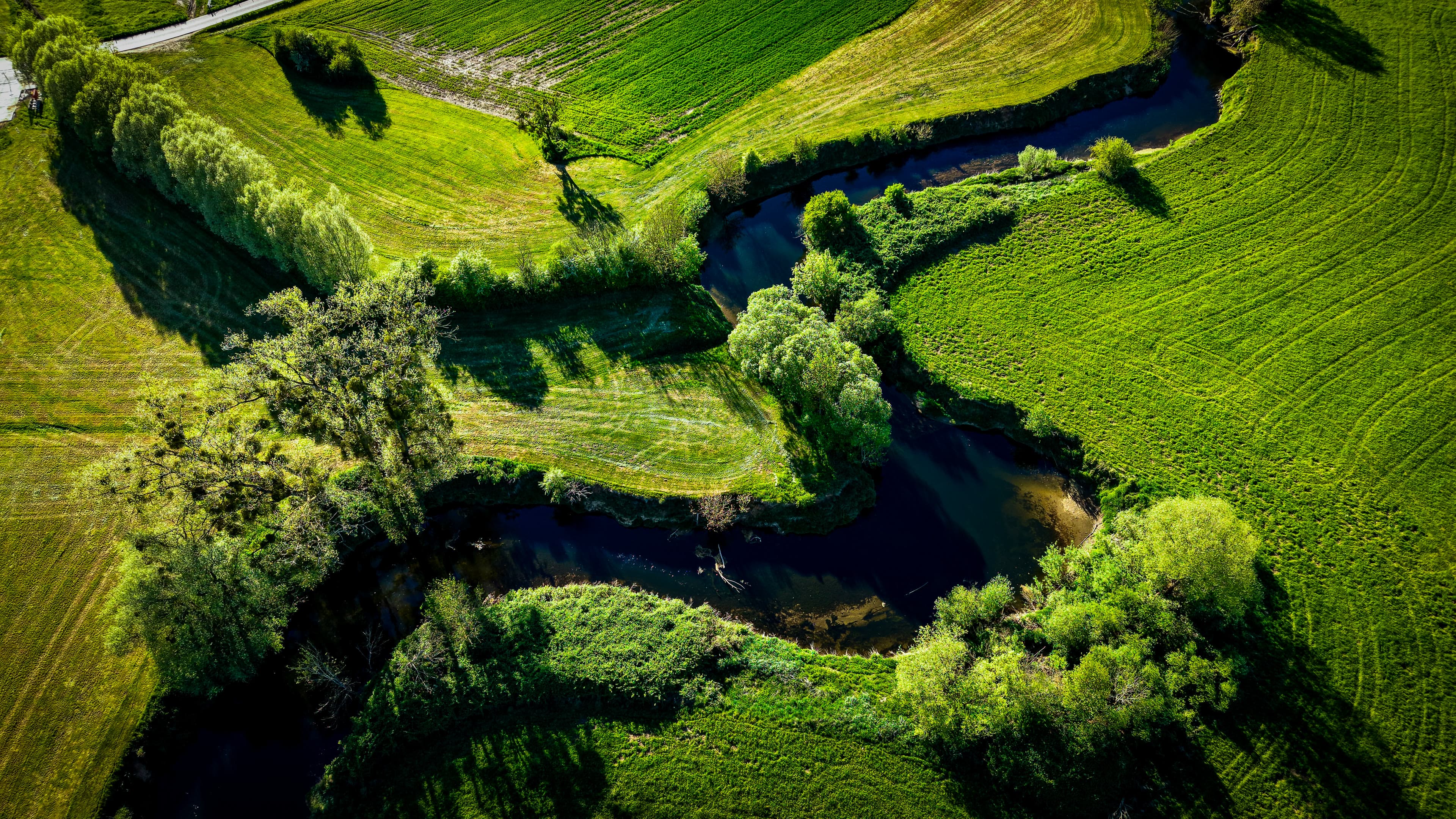 The Alzette meanders through spring fields, Lorentzweiler